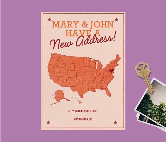 A moving announcement card with an orange map of the United States with a heart over an East Coast location and orange text reading 'MARY & JOHN HAVE A NEW ADDRESS', over a purple backdrop with a key and a stack of photographs.