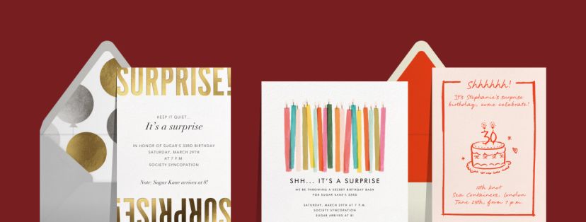 A white invitation with gold SURPRISE lettering and a silver envelope, a white invitation with rainbow candles, and a pink invitation with a doodle of a cake, all on a maroon backdrop.
