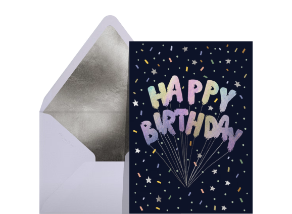 A black confetti card with balloons that spell HAPPY BIRTHDAY
