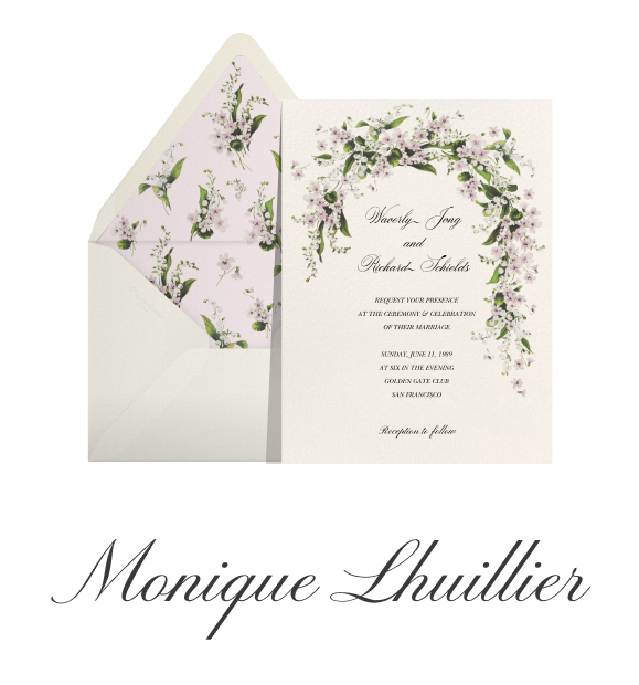 Text that reads 'Monique Lhuillier' paired with a wedding invitation that features a pink, green, and white illustrated floral garland paired with an off white envelope and matching floral envelope liner. 