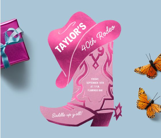 A pink cowboy boot-shaped invitation with a 10-gallon hat on top with a present and butterflies on a blue backdrop.